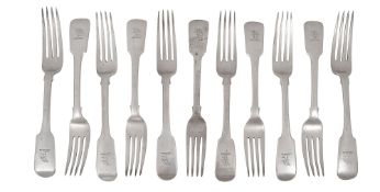 Eleven William IV silver fiddle pattern table forks