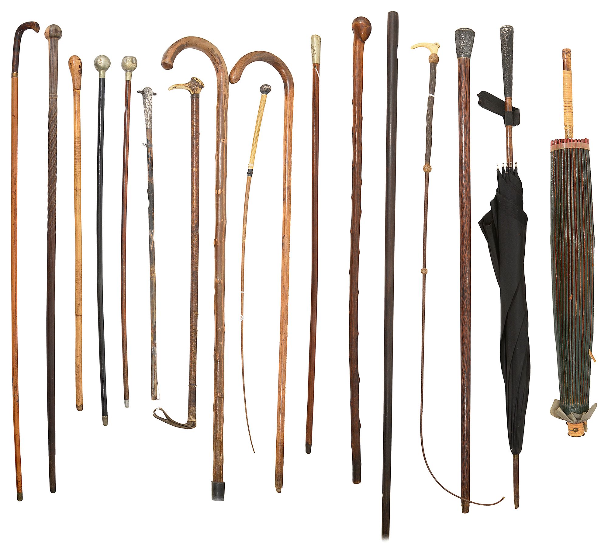 A collection of eighteen canes, walking sticks, riding crops and umbrellas