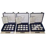 Three sets of boxed silver coins