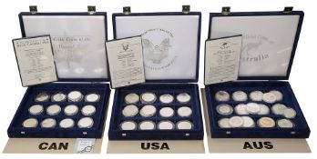 Three sets of boxed silver coins