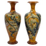 A pair of Doulton Lambeth vases decorated by Frank H Butler