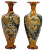 A pair of Doulton Lambeth vases decorated by Frank H Butler