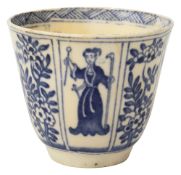 An 18th century English blue and white Chinoisierie decorated soft paste beaker shaped cup