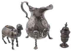 A late Victorian silver novelty camel pin cushion, a cream jug and a pepper pot