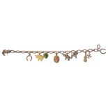 A gold oval link charm bracelet