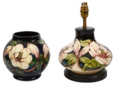 A Moorcraft 'Magnolia' pattern lamp and vase