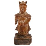 A 19th century Chinese wood carving of a guardian