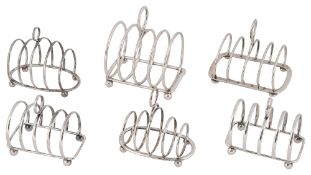 Six Edwardian and later silver toast racks