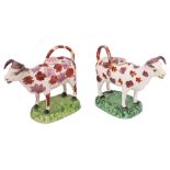 Two early 19th century Swansea type pearlware pottery cow creamers and covers