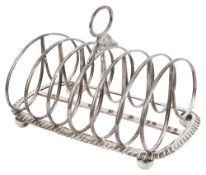 A late George III silver seven bar toast rack