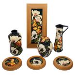 A group of seven Moorcroft 'Miss Alice' pattern pieces