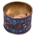 An early 20th century Russian .84 silver-gilt cloisonne and enamel napkin ring