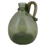 An 18th century green glass water jug