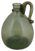 An 18th century green glass water jug