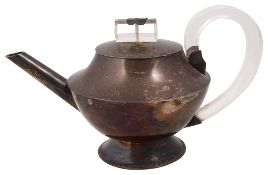 A mid 20th century silver teapot, plus a tea strainer and a pepperette.