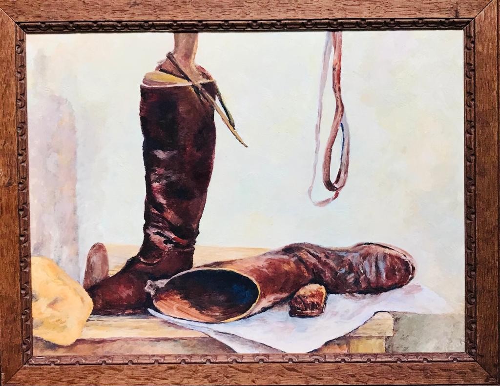 MEG BOSS OIL ON BOARD- RIDING BOOTS, FRAMED, APPROXIMATELY 33cm x 44cm