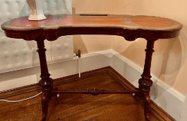 WALNUT VICTORIAN WRITING TABLE WITH SHAPED BORDERS, CIRCA 1860