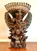 INTRICATELY CARVED THAI HARDWOOD FIGURE, APPROXIMATELY 40.5cm HIGH NOSE DEFICIENT