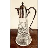 CUT GLASS CLARET JUG WITH SILVER PLATED MOUNTS AND COVER