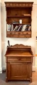 SMALL VICTORIAN PINE CUPBOARD WITH CENTRAL HINGED DOOR AND SIMILAR SHELVES