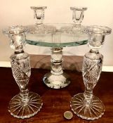 GLASS CIRCULAR STAND WITH FACETED STEM AND TWO PAIRS OF CUT GLASS CANDLESTICKS