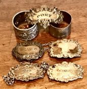 TWO SILVER NAPKIN RINGS, TWO HALLMARKED SILVER WINE LABELS, TWO UNHALLMARKED SILVER WINE LABELS