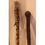 TWO BAMBOO WALKING STICKS, APPROXIMATELY 100cm LONG
