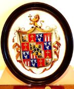 OVAL AND FRAMED, PAINTED AND GILDED COAT OF ARMS (FAMILY UNKNOWN)