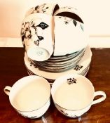 EIGHTEEN PIECE CHINA TEA SET 'CZECHOSLOVAKIA' DECORATED WITH WINTER ROSES SOME PIECES CHIPPED