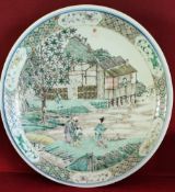 19th/20th CENTURY ORIENTAL FAMILLE VERTE CIRCULAR CERAMIC PLAQUE,DECORATED WITH ORIENTAL VILLAGE