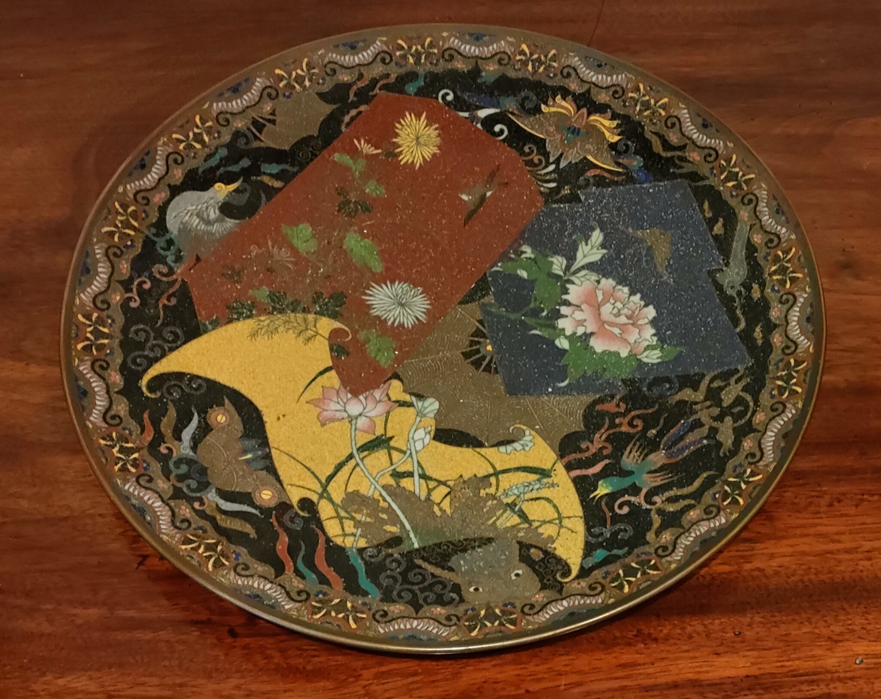 ORIENTAL CLOISONNE GLAZED CIRCULAR PLAQUE DECORATED WITH FOLIAGE AND BIRDS, DIAMETER APPROXIMATELY