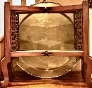 ORIENTAL FOLDING FRAME TABLE AND BRASS CIRCULAR PLAQUE TOP