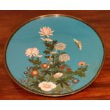 GLAZED CLOISONNE CIRCULAR PLAQUE DECORATED WITH FLOWERS, DIAMETER APPROXIMATELY 30cm USED, SOME