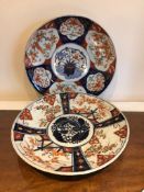 TWO 19th CENTURY JAPANESE IMARI PLAQUES IN TYPICAL PALETTE, APPROXIMATELY 30cm AND 29cm