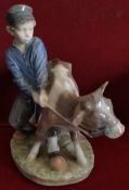ROYAL COPENHAGEN GLAZED CERAMIC FIGURE DEPICTING A BOY WITH CALF REASONABLE, USED CONDITION