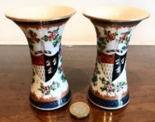 SMALL PAIR OF ARMORIAL VASES, APPROXIMATELY 11cm HIGH