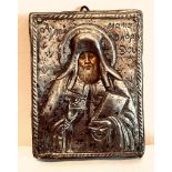 19th CENTURY REPOUSSE SILVER COLOURED METAL CHRISTIAN ICON, APPROXIMATELY 8.5 x 6.5cm