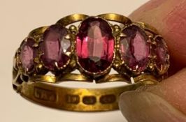 12ct GOLD RING SET WITH FIVE AMETHYSTS, WEIGHT APPROXIMATELY 2.1g