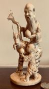 IVORY OKIMONO FIGURE OF STAG AND ATTENDANTS, APPROXIMATELY 15cm HIGH