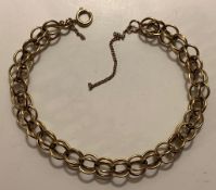 9ct GOLD DUO LOOP BRACELET, WEIGHT APPROXIMATELY 11.1g