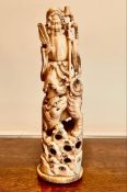 19th CENTURY IVORY CARVED FIGURE OF AN IMMORTAL, JAPANESE