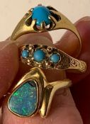 14ct GOLD BLACK OPAL RING. APPROX 3.5G, 22ct GOLD RING WITH THREE TURQUOISE COLOURED STONES.