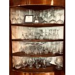 LARGE QUANTITY OF ASSORTED GLASSWARE INCLUDING CUT GLASS, CHAMPAGNE GLASSES AND DECANTER, ETC.