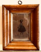 SEMI-SILHOUETTE FULL LENGTH PORTRAIT OF A CHILD, CIRCA 1820, WITHIN WALNUT COLOURED OGEE FRAME,