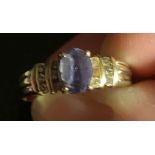 14ct GOLD RING SET WITH PURPLE TOURMALINE APPROX 1.5ct AND BRILLIANTS, SIZE Q, TOTAL WEIGHT