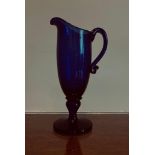 SMALL BLUE GLASS EWER, APPROXIMATELY 18.5cm HIGH
