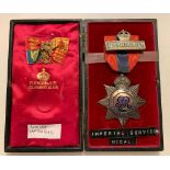 IMPERIAL SERVICE ORDER, IN BOX, WITH BADGE TO RICHARD BRATCHFORD