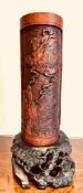 CARVED BAMBOO STICK STAND UPON CARVED HARDWOOD BASE, APPROXIMATELY 47cm HIGH