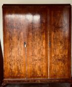 FINE TRIPLE WARDROBE WITH FIGURED PANEL TO DOORS