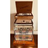 SEVEN EMPTY CIGAR BOXES, TOP ONE INCLUDES SUNDRY MATCHES